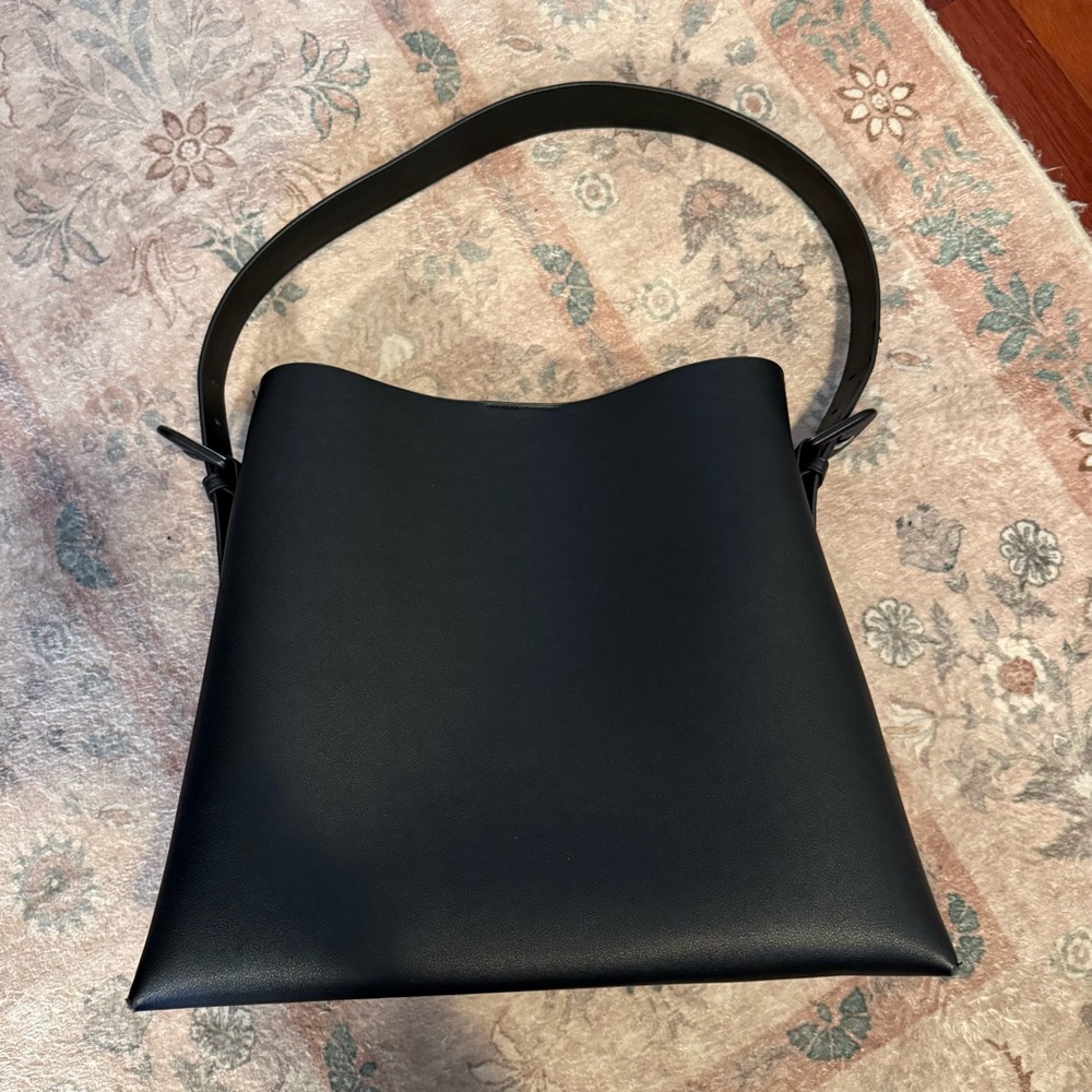 Faux leather tote with buckles